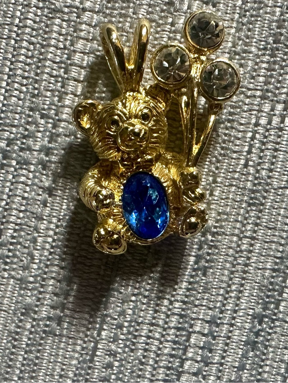 Avon Gold Teddy Bear Pin with Blue and Clear Stones